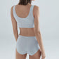 Woman wearing a NuCloud Original Mid-Rise Brief Set Blue on a plain background