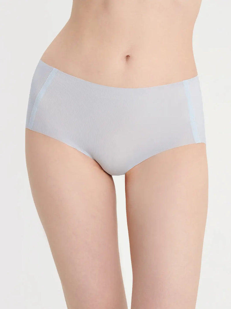 NuCloud Original Mid-Rise Brief white seamless underwear with raw cut edges and full coverage.