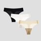 Three pairs of NuCloud Original Thong in black, white, and beige on a light gray background