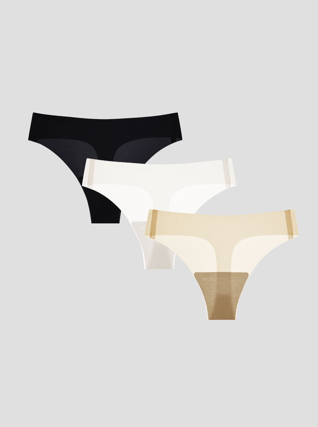 Three pairs of NuCloud Original Thong in black, white, and beige on a light gray background