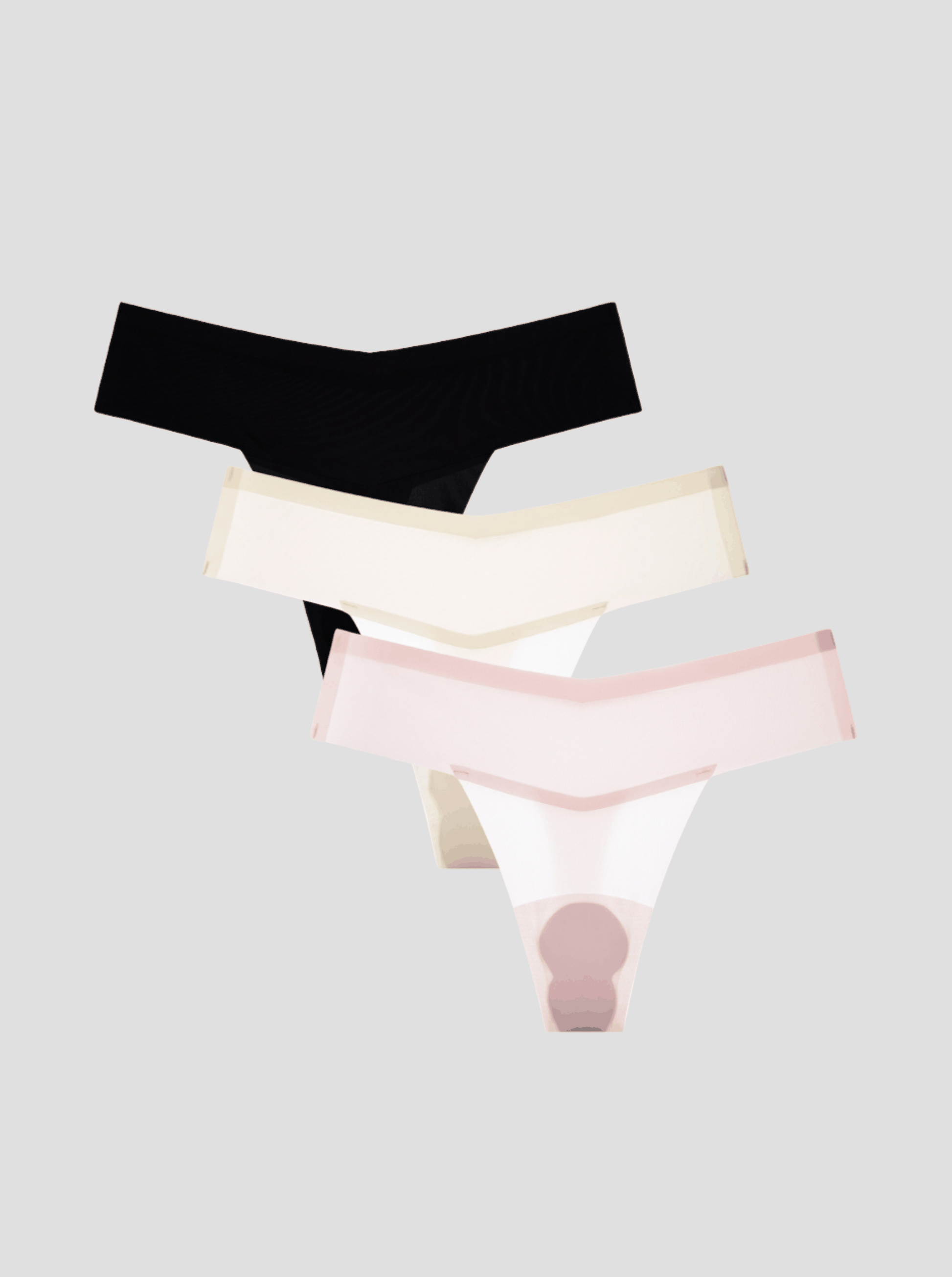 NuShield Thong Light 3-pack seamless thong underwear in black, beige, and pink with anti-camel toe protection and silk-enhanced gusset
