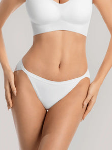 woman wearing white NuSoft String Bikini with high-cut legs and shiny elastic waistband